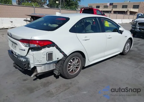 2020 Toyota Corolla Hybrid Le z USA, uszkodzony, nr VIN JTDEBRBE9LJ015060